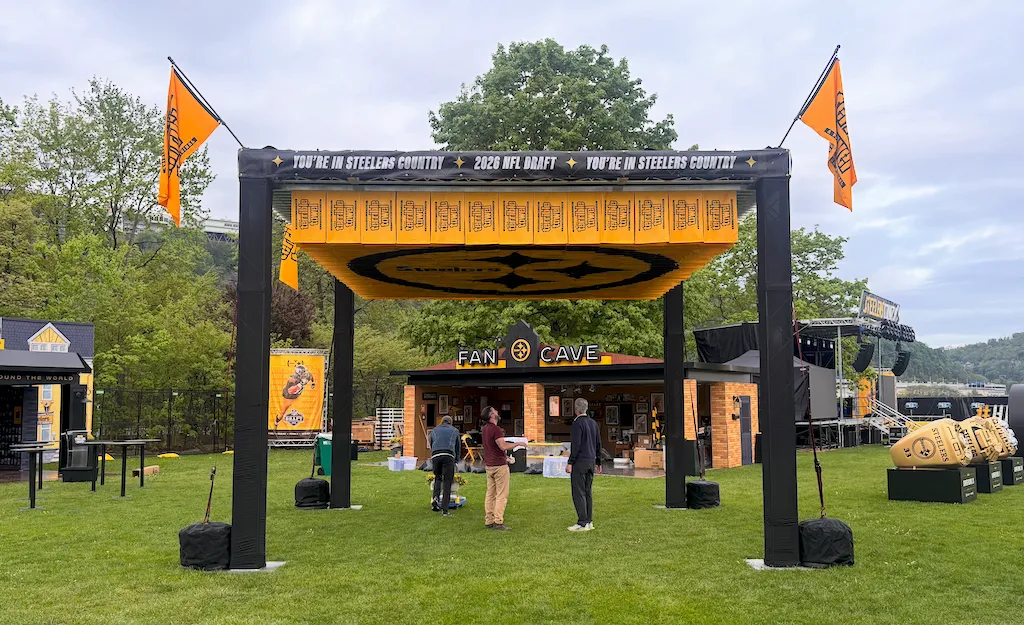 The Terrible Towel installation illuminated at night.